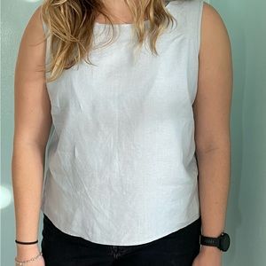 Large sky, blue linen sleeveless blouse by CB Studios by Cory B